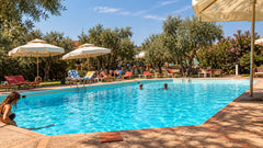 Image of a swimming pool. Sun loungers sunshine 