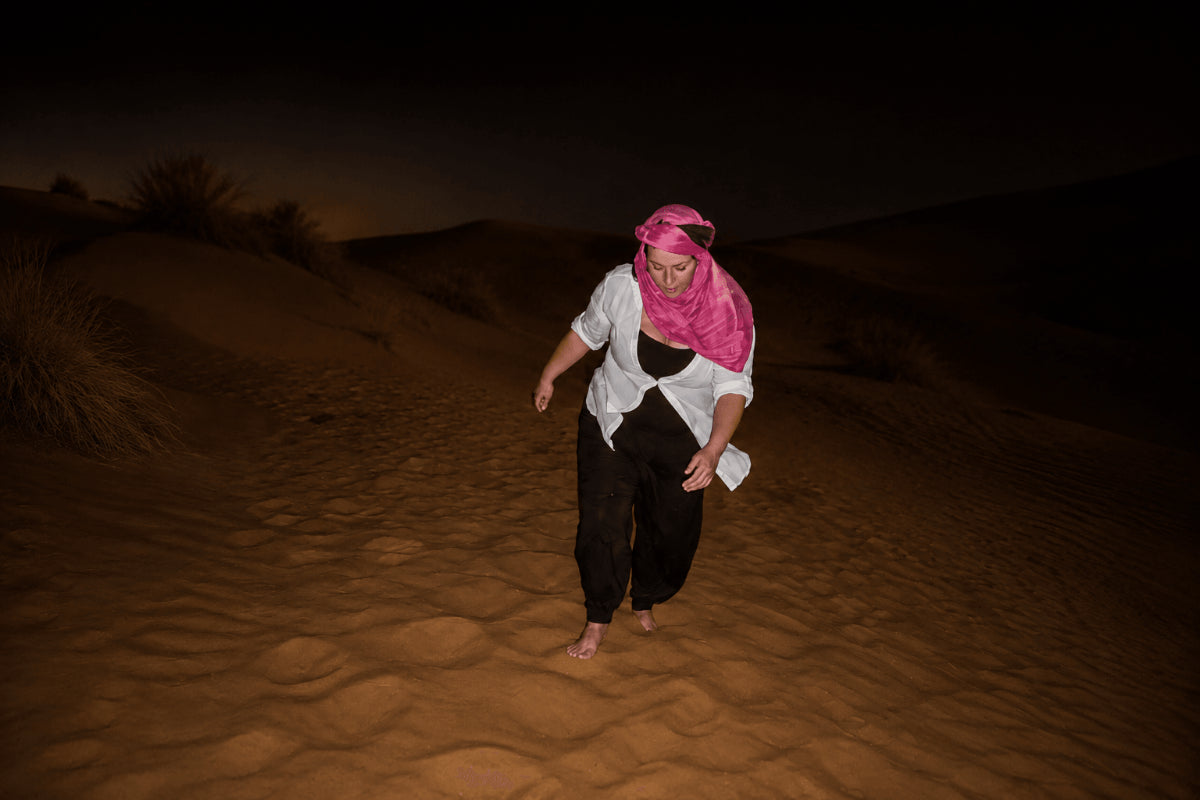 Francine Sharrock's walking on the sand dunes of the Sahara desert. 